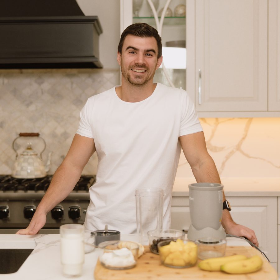 Nate Bladecki, MPH, RD, in the kitchen with the whole-food ingredients the Reset is built on